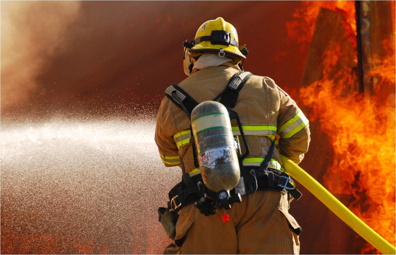 fire man putting out fire